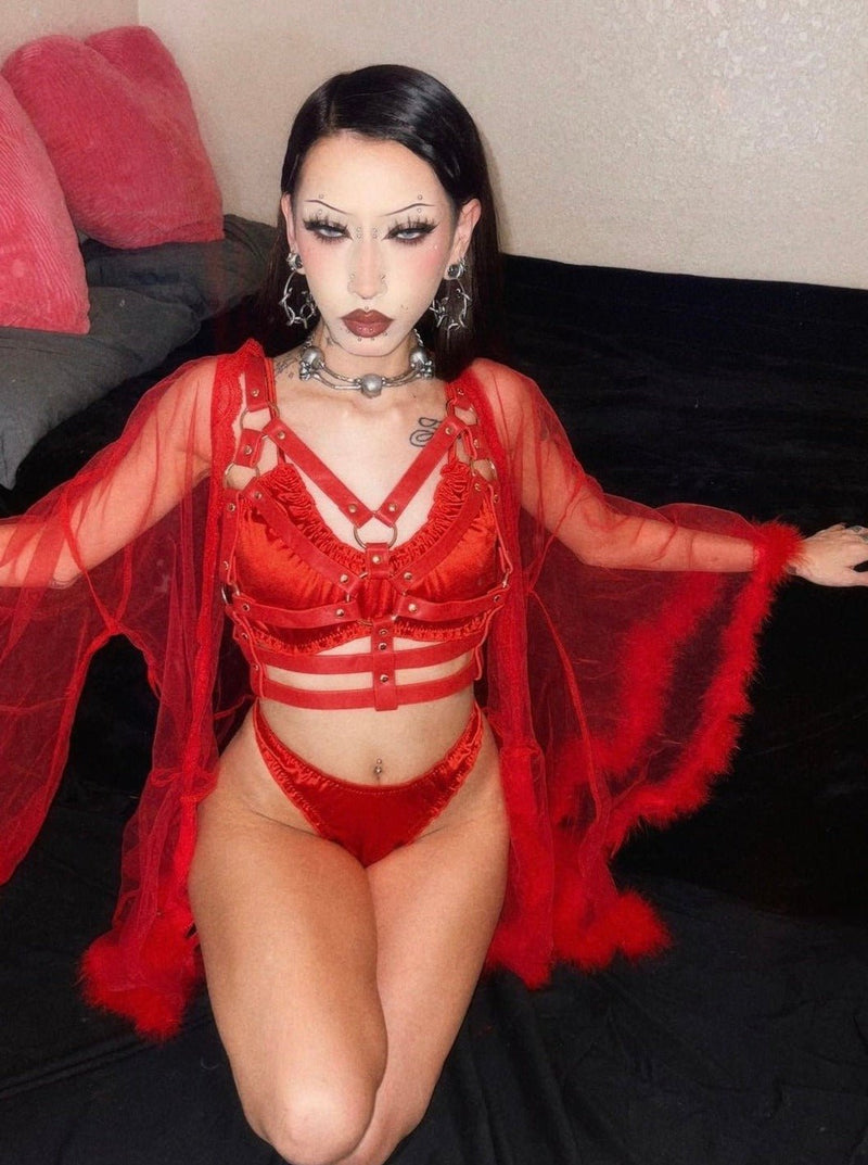 Female model wearing our Cherry Red Tatum Satin Bralette and Briefs with our Cherry Red Billie Chest Harness.